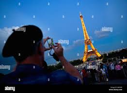 The man on the eiffel tower hi-res stock photography and images - Alamy