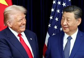 FILE PHOTO: U.S. President Donald Trump meets with Chinese President Xi Jinping on the sidelines of the APEC summit, in Busan