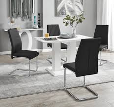 Modern white gloss dining table with stainless steel base. Imperia White Gloss Dining Table 4 Lorenzo Chairs Furniturebox