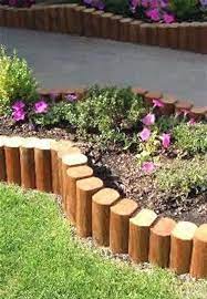 Landscape Timber Edging Is Very Easy To Mount And Creates An Appealing Natural Looking Fra Landscape Timber Edging Garden Edging Ideas Cheap Landscape Timbers