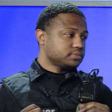 "All I could think about was my son," Syracuse cop who shot ax-wielding man  back