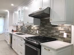 44 reasons modern cabinets are the stars of the kitchen Modern Kitchen Featuring Unify White Finish Cabinets And Crown Molding Fengfa Kitchen Cabinets Bathroom Vanities Richmond Hill Markham
