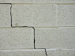 How to repair a concrete foundation by parging. Repair Crumbling Cinder Block The Money Pit