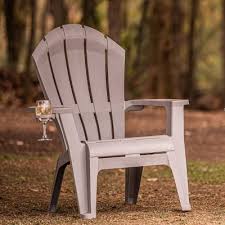 The adirondack style chair is an outdoor chair generally made of wood and designed with a flat seat, a back made of a flat board, and wide armrests parallel to the ground. Patio Plastic Adirondack Chair Target
