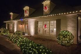 Create tabletop displays and fill other empty spaces with motifs of small beach decorations and strands of white christmas lights. Christmas In July Outdoor Holiday Lighting In Virginia Beach