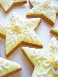 The recipe makes a dark chocolate shortbread style cookie and a simple vanilla glaze. Star Cookies Cookie Decorating Christmas Sugar Cookies Star Cookies