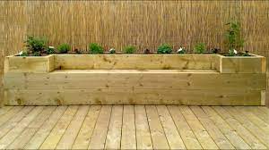 In another place this might be called a sleepers bench, but since it is situated in a garden, we'll still call it a garden bench. Softwood Decking Raised Bed Bench Youtube
