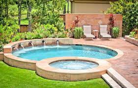 This backyard features modern architecture, while the small pool area also has straight and sharp edges, lines with blue mosaic tiles to make its water color stand out from the earthen hues of the structure. Small Swimming Pools 17 Pool Designs For Your Home
