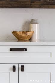 While farmhouse might be at the core of this design, textural elements elevate the look to and don't even get us started on the color of those cabinets. Rustic Modern Kitchen Cabinets Maison De Pax