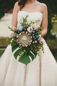 Particular attention should be paid to the bride's bouquet. 9 Gorgeous Tropical Wedding Bouquets