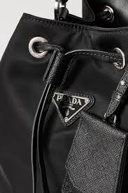 Shop women's prada bucket bags. Black Tessuto Textured Leather Trimmed Nylon Bucket Bag Prada Net A Porter