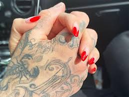 Close to his heart, too. Travis Barker Kourtney Kardashian Confirm Romance 7 Rock Stars Who Dated Models Entertainment Photos Gulf News