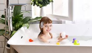 The best thing to feed baby ducks and baby geese is a 21% non medicated starter feed. Happy Little Baby Girl Sitting In Bath Tub Playing With Yellow Duck Toy In The Bathroom Baby Bathing With Toys In A Bath Full Of Foam Near Window Stock Photo Picture And