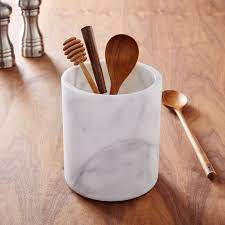 The combination of rubber wood frame and marble table top adds a modern sense and the artificial marble table top has a unique glossy appearance, which is most suitable for any dining space, kitchen area, etc. White Marble Kitchen Utensil Holder Kitchen Marble Kitchen Utensil Holder White Marble Kitchen