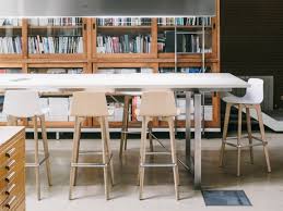 A regency gilded wood stool, carved with lotus leaf decoration and lion paw feet, based on a design from thomas hope's 'household furniture and interior decoration,' 1807. Lottus Wood Stool Ufl Group