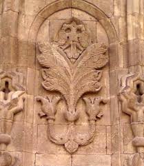erzurum cifte minareli medrese hayat agaci kurt ejder ve cift basli kartal ikonografisi ejderhalar tanricalar hayat agaci