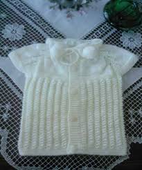 Sarili Beyazli Degisik Orgu Bebek Yelek Modeli Bebek Yelek Tig Isi Bebek Orgu