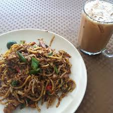 Teh ais is tea sweetened with condensed milk that is simply served in a glass with ice cubes. Bright And Colourful Mamak Mee Goreng And Teh Ais My Food Journey Is