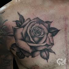 Black And Gray Realistic Rose Tattoo Chest Tattoo Www Cap1tattoos Com Realistic Rose Tattoo Rose Chest Tattoo Black And Grey Rose Tattoo