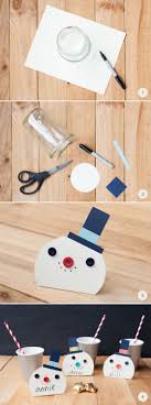 Cut various size circles out of christmas cards, scalloping the edges of some. Diy Snowman Place Cards Julep
