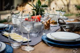 Mediterranean dinner party turn your backyard into a seaside utopia inspired by the romantic coastal towns, whitewashed houses and azure sea of the greek islands. Table Served For Party Dinner In Mediterranean Style Stock Photo Picture And Royalty Free Image Image 102031811