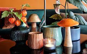 The bottle is a bigger version of the popular handmade bottles of recycled glass. Mica Decorations