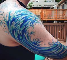 The one below just shows the shore or the beach. Simple Ocean Wave Tattoo Designs
