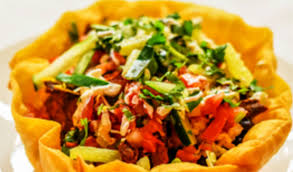 Flour tortillas with cheese and a crunchy tostada layer. Islands Fresh Mex Grill Monkey Junction Wilmington Nc 28412