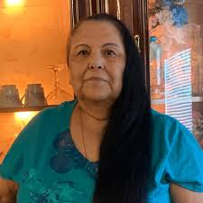 Short trendy hair cut with fun colors and hair tinsel in Alma area?