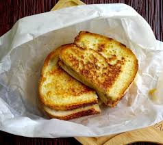Uses For Parchment Paper 30 Creative Ideas For This Handy Kitchen Tool Making Grilled Cheese Grilled Cheese In Toaster Baked Grilled Cheese