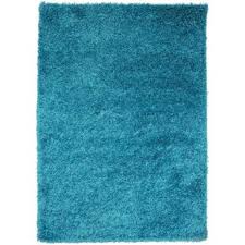 The soft ivory, gray and teal are both modern and timeless, combined with elegant abstract patterns and a very soft feel make a terrific addition to any space. Teal Rugs You Ll Love Wayfair Co Uk