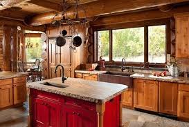 Dark wood covers the floor, kitchen cabinets, and ceiling in this moody rustic home. Cozy Rustic Home Decorating Houzz Home Design Decorating And Remodeling Cozy Rustic Kitc Log Home Kitchens Rustic Kitchen Sinks Rustic Kitchen