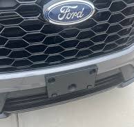 How to remove front license plate bracket and cover holes on ...