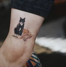 Cat Tattoos Are Now Meow In 2020 Cat Tattoo Designs Cat Tattoo Tattoos