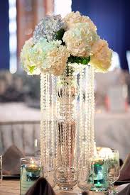 The Tables Were Tastefully Decorated As Show Pieces Giving Clients A Sample Of What Thei Wedding Theme Centerpieces Great Gatsby Themed Wedding Gatsby Wedding