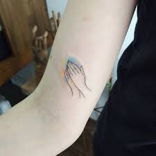 It's very meaningful, symbolic and can be worn by all. Small Praying Hands Tattoo On The Arm Tattoogrid Net