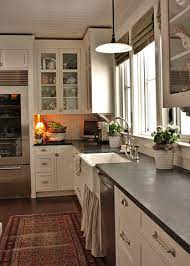 Cabinets over the sink hang between 24. Beadboard Backsplash Deep Farmhouse Sink Ruffled Skirt Under Sink Simple Pend Kitchen Remodel Galley Kitchen Remodel Kitchen Remodel Small