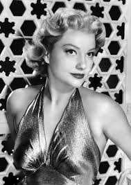 Lillian Rich and Warner Baxter in a scene from the surviving 1925 silent  drama The Golden Bed, directed by Cecil B. DeMille.