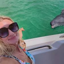 What are reputable companies to charter a boat for a Blue Angels practice  in July near Pensacola Beach, Florida?