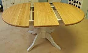 Extendable dining room tables don't come in different sizes. Andrena Barley Large Extending Oval Pedestal Dining Table Dining Tables Hafren Furnishers