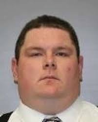 State Police investigator charged with weapons possession suspended without  pay