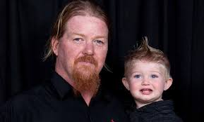 Community mourns with families who lost their sons