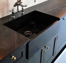 Contractors have developed a variety of strategies to minimize the weight, hide seams, and add thickness without increasing the overall mass. Black Concrete Countertops Juniper Home