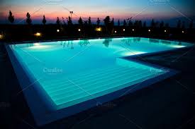 Swimming Pool At Night Pool At Night Swimming Pools Pool