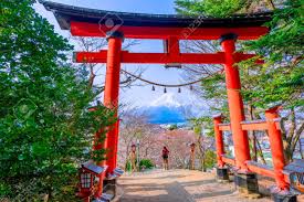 Red Wooden Gate At Arakura Sengen Shrine With Mount Fuji In The Stock Photo Picture And Royalty Free Image Image 126180851