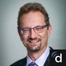 Dr. Christopher J. Neal, MD