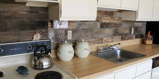 For a warm and inviting rustic touch, use reclaimed wood panels from old barns, old buildings, and various other sources. Remodelaholic How To Install A Pallet Wood Back Splash