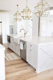 In this kitchen, upper cabinets are open to display pretty dishes and cooking. Pin By Mandy Nicole On Dream House White Kitchen Inspiration White Kitchen Design Gorgeous White Kitchen