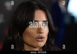 Spanish actress Penelope Cruz poses prior to receiving the Order of  Commandeur des Arts et des Lettres from French Minister of Culture and  Communication Renaud Donnedieu de Vabres during a ceremony held