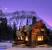 Small Log Cabin In Mountains